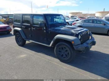  Salvage Jeep Wrangler